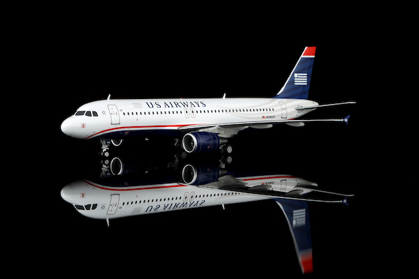 Airbus A320 US Airways "Sully" N106US Flaps Down (one flapfairing detached on each wing) L2236FDFLAP